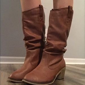 Women’s tall western styled heeled boots